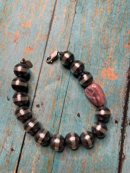 Navajo Sterling Silver And Rhodochrosite 12mm Beaded Bracelet